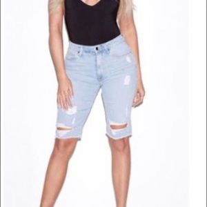Good American distressed long shorts